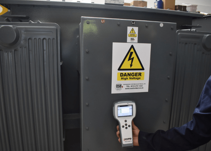 An electrical engineer from ESE performing a partial discharge test to ensure there is no deterioration in the electrical insulation.