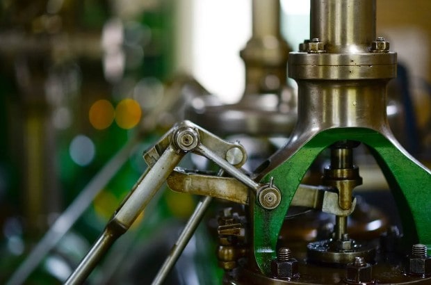 Equipment at a manufacturing plant being powered through high-voltage equipment.